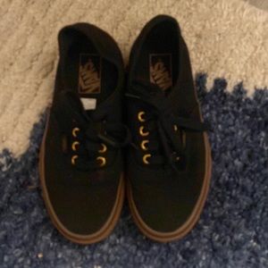 Women’s size 6 black Vans with gum sole. Like new!!